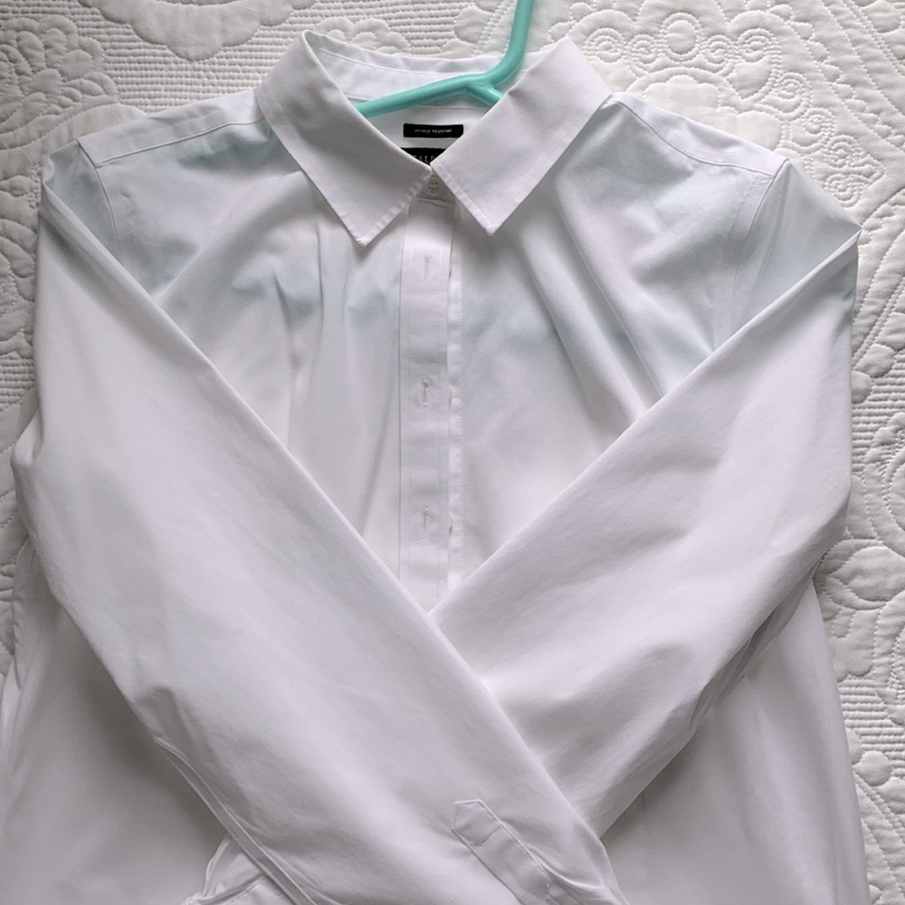 Long sleeved white blouse.